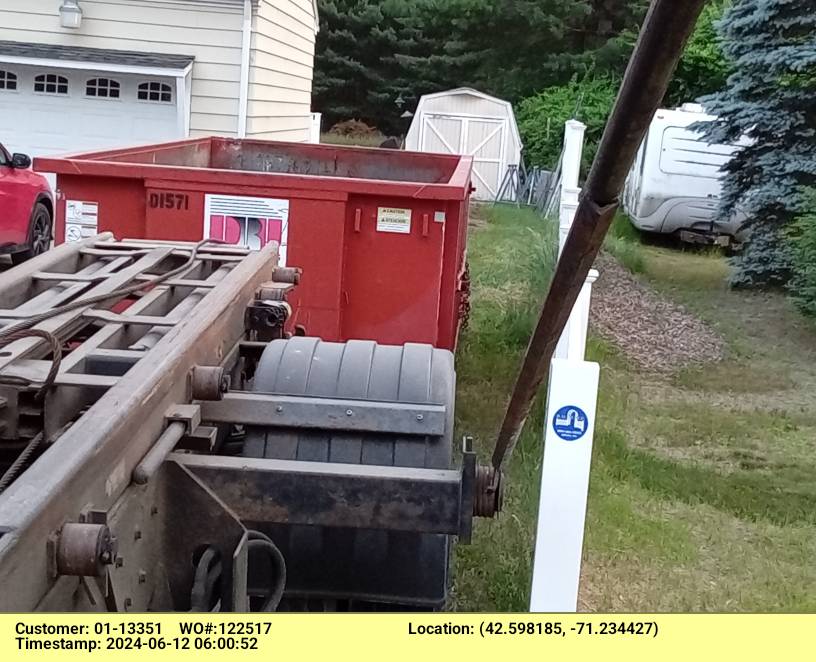 15 yard dumpster rental, with a 2 ton weight limit, delivered in Tewksbury, MA for a garage cleanout.