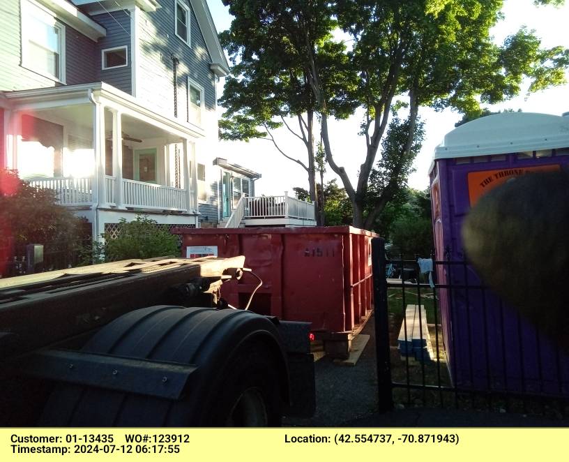 15 yard dumpster rental delivered in Beverly, MA for a construction project.