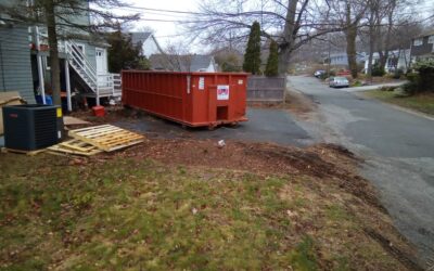 30 yard dumpster with a 4 ton weight limit delivered in Gloucester, MA for a construction project.