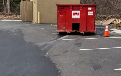 30 yard dumpster swapped out at a construction site in Gloucester, MA