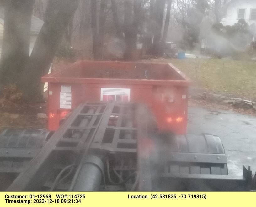 15 yard dumpster rental, with a 2 ton weight limit, delivered in Manchester, MA for construction debris.