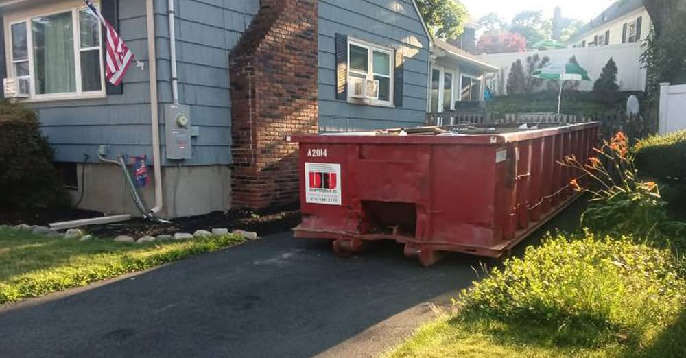 20 Yard Dumpster Rental Pickup in Salem, MA for a Garage Clean-out | Dumpsters R Us, Inc