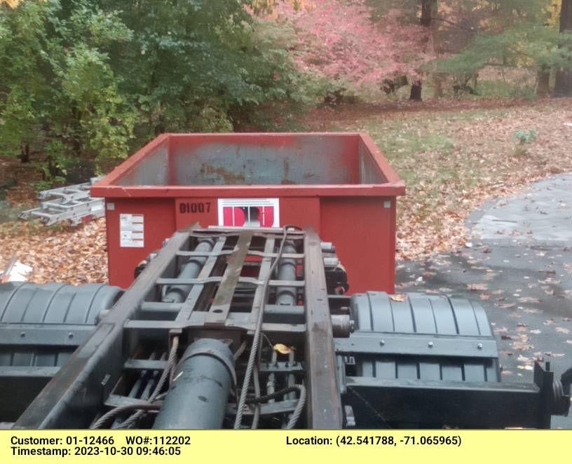 10 yard dumpster rental with a 1 ton weight limit delivered in Lynnfield, MA for junk removal.
