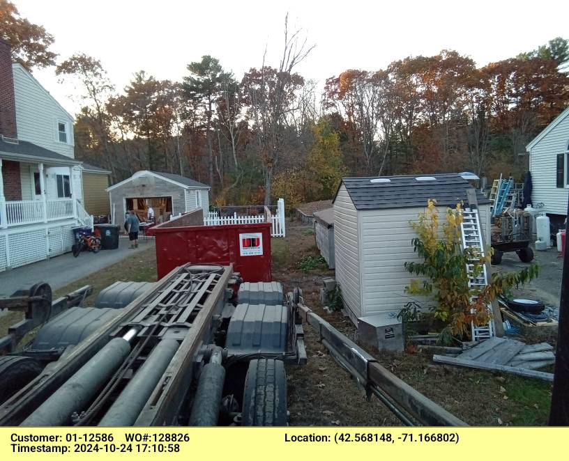 30 yard dumpster retnal, with a 5 ton max, delivered in Wilmington, MA for a construction project.