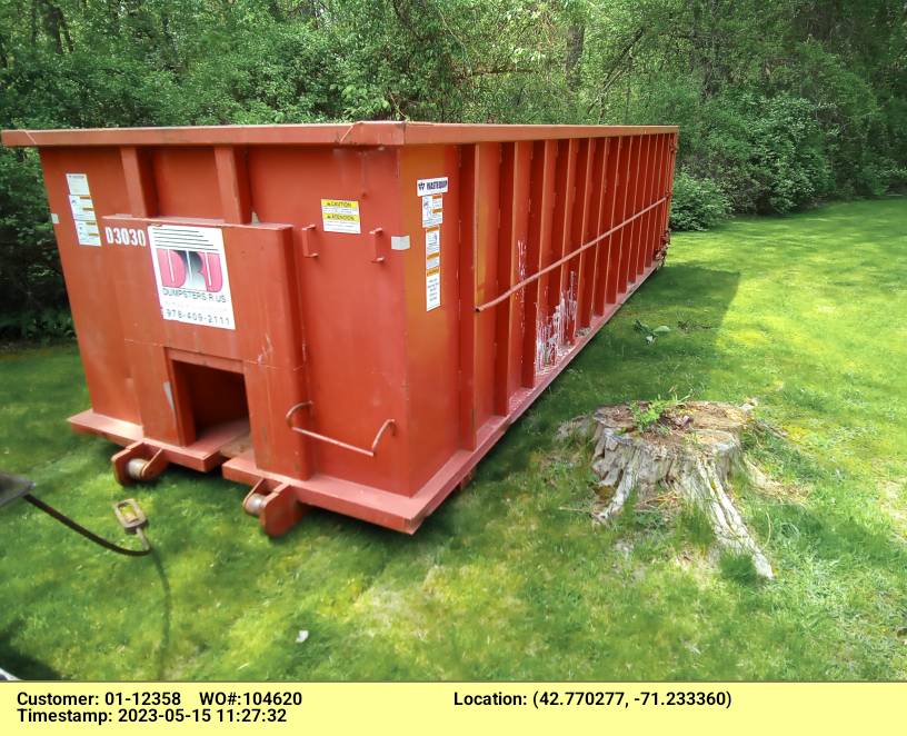 30 yard dumpster rental with a 4 ton weight limit delivered in Salem, NH for a construction project.