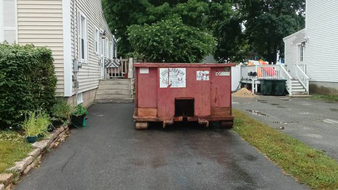 10 yard dumpster removed from Amesbury, MA 01913 after a completed construction and demo cleanup