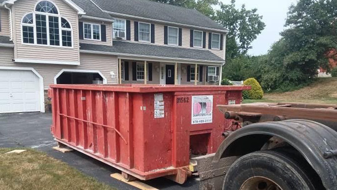 10-yard dumpster delivered for a residential remodeling project in Dracut, MA
