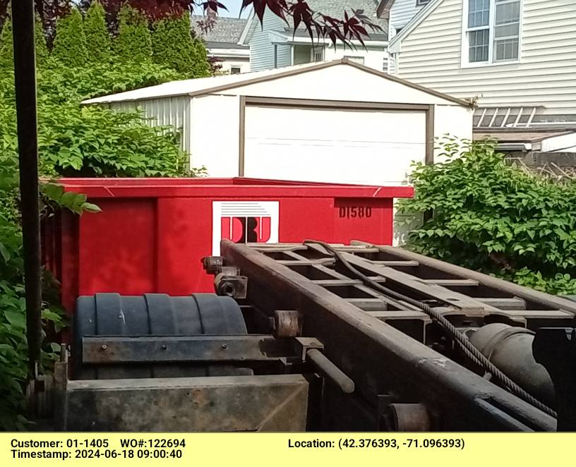 15 yard dumpster rental, with a 2 ton limit, delivered in Somerville, MA for a small construction project.