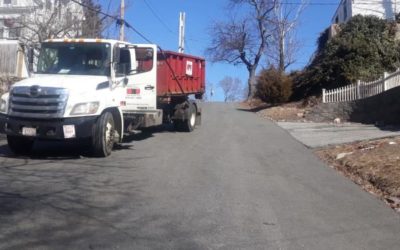 10 yard dumpster delivery with our 2011 Hino to Lynnfield, MA