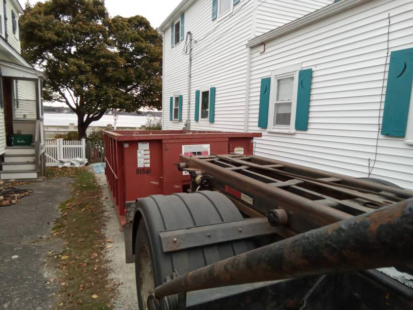 15 yard dumpster rental with a 2 ton weight limit delivered in Salem, MA for a house clean-out.