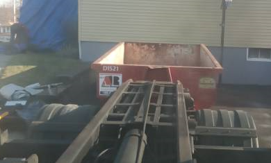 15 yard dumpster rental delivered in Lawrence, MA for a small roofing project.