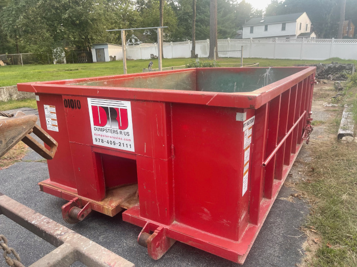 10 yard dumpster rented with a 1 1/2 ton max to dispose of household junk from a household clean up in Tewksbury, MA-