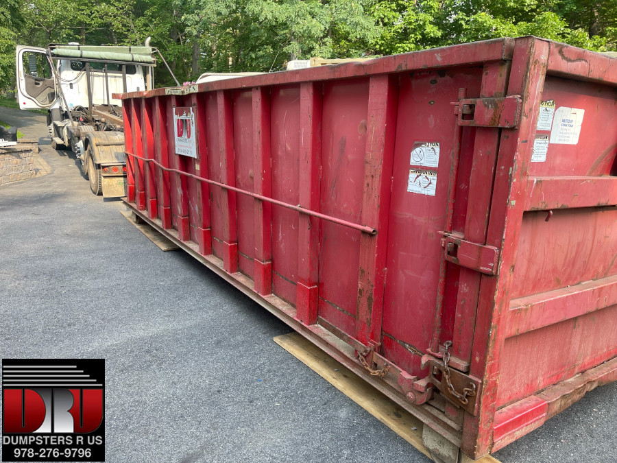 Delivery of 30 Yard Dumpster Rental in Windham NH for Basement Clean Out