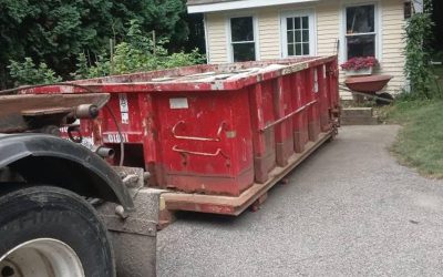 10-yard dumpster pickup after residential remodeling in Amesbury, MA