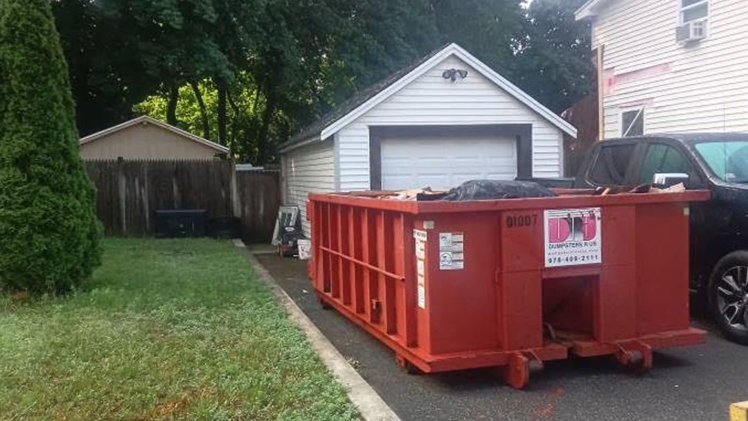 10-yard construction and demo dumpster delivered in North Reading, MA 01864 for construction debris cleanup