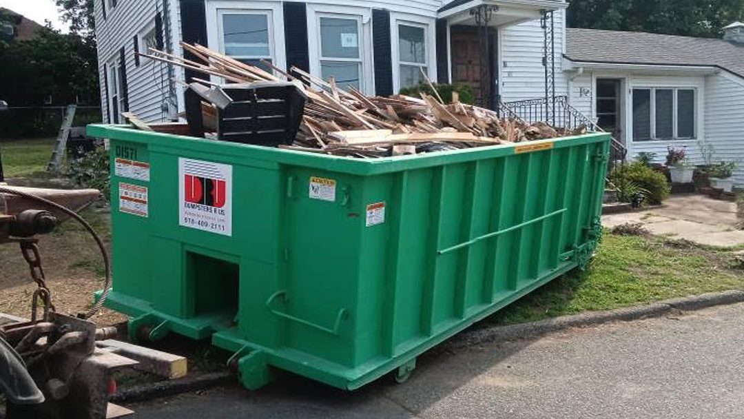 10-yard construction dumpster picked up in Haverhill, MA