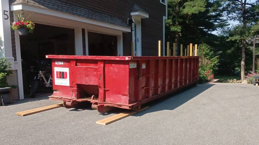 20-yard construction dumpster from Dumpsters R Us delivered to a Middleton, MA driveway