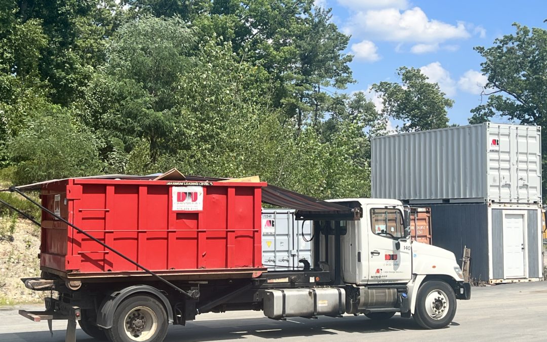 15 yard dumpster rental with a 2 ton max removed from a home cleanout in Wilmington on the way to the dumping facility in North Andover.