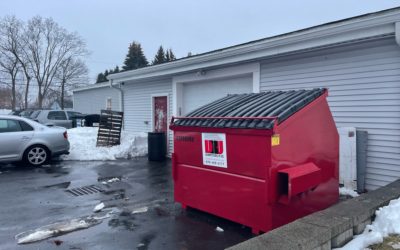 6 yard commercial dumpster in Methuen for a specialty auto body shop.