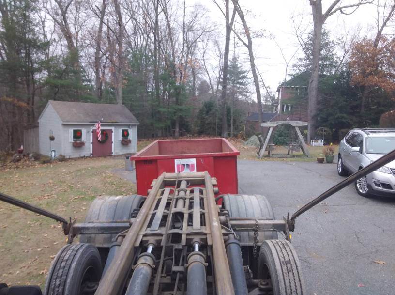 15 yard dumpster rental with a 2 ton max in Dracut for a Basement Clean Out Project.